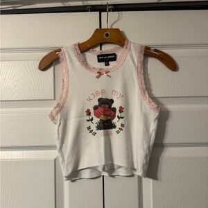 White and pink graphic tank top. Size 8 (fits small)